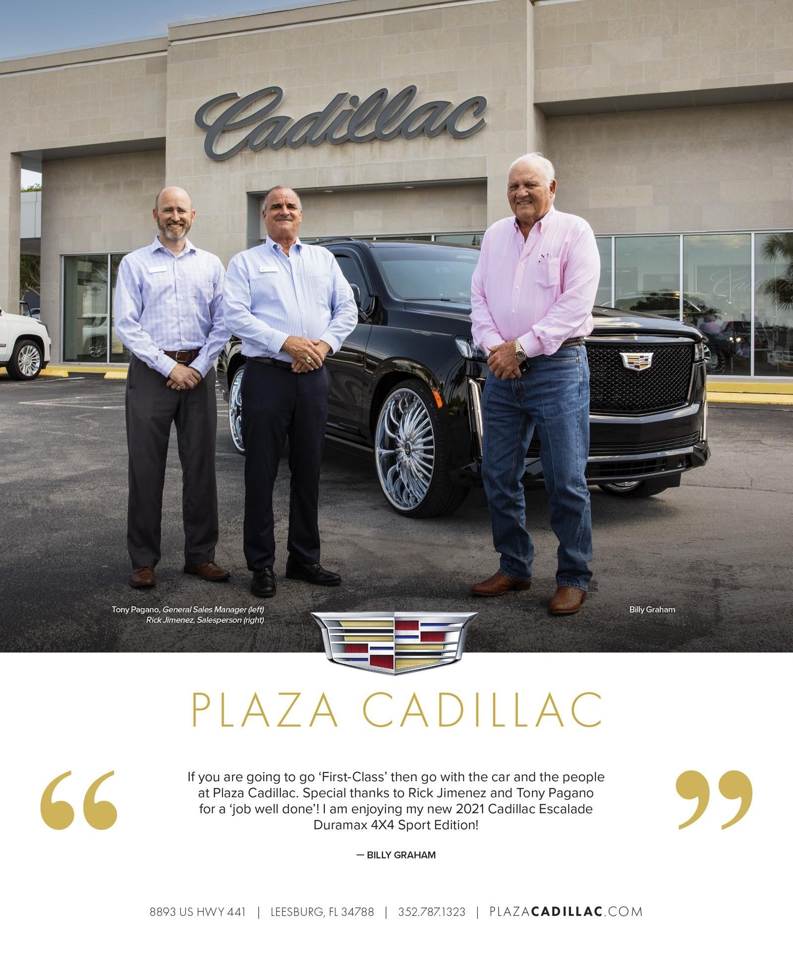 Three men in front of a black Cadillac