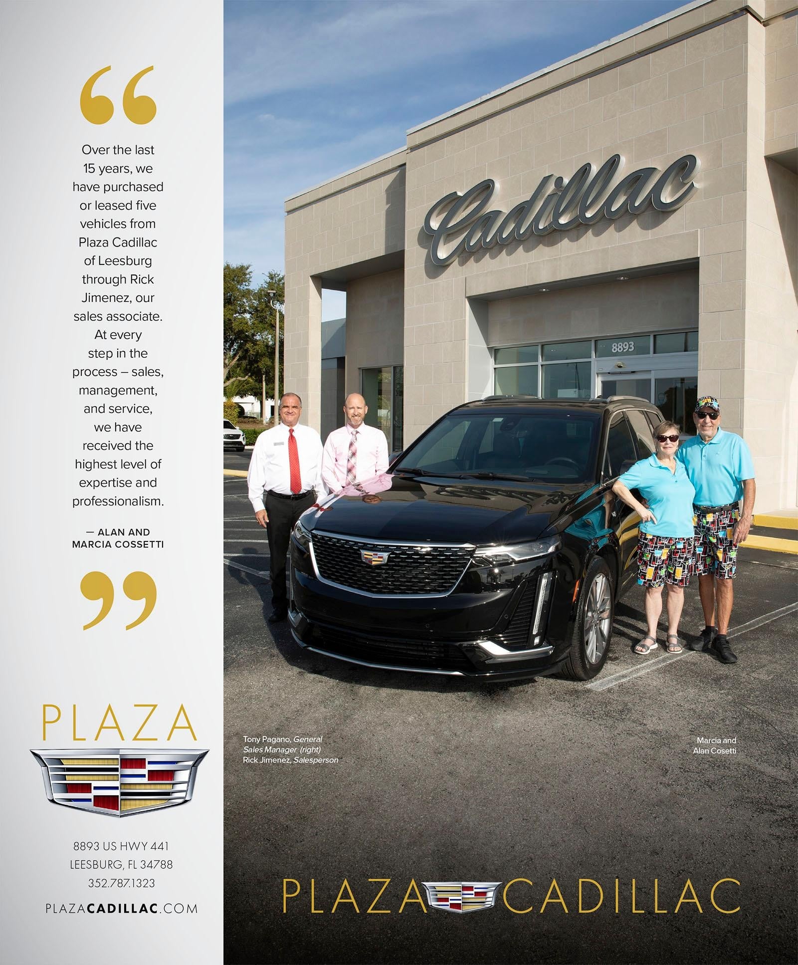 4 adults next to a black Cadillac