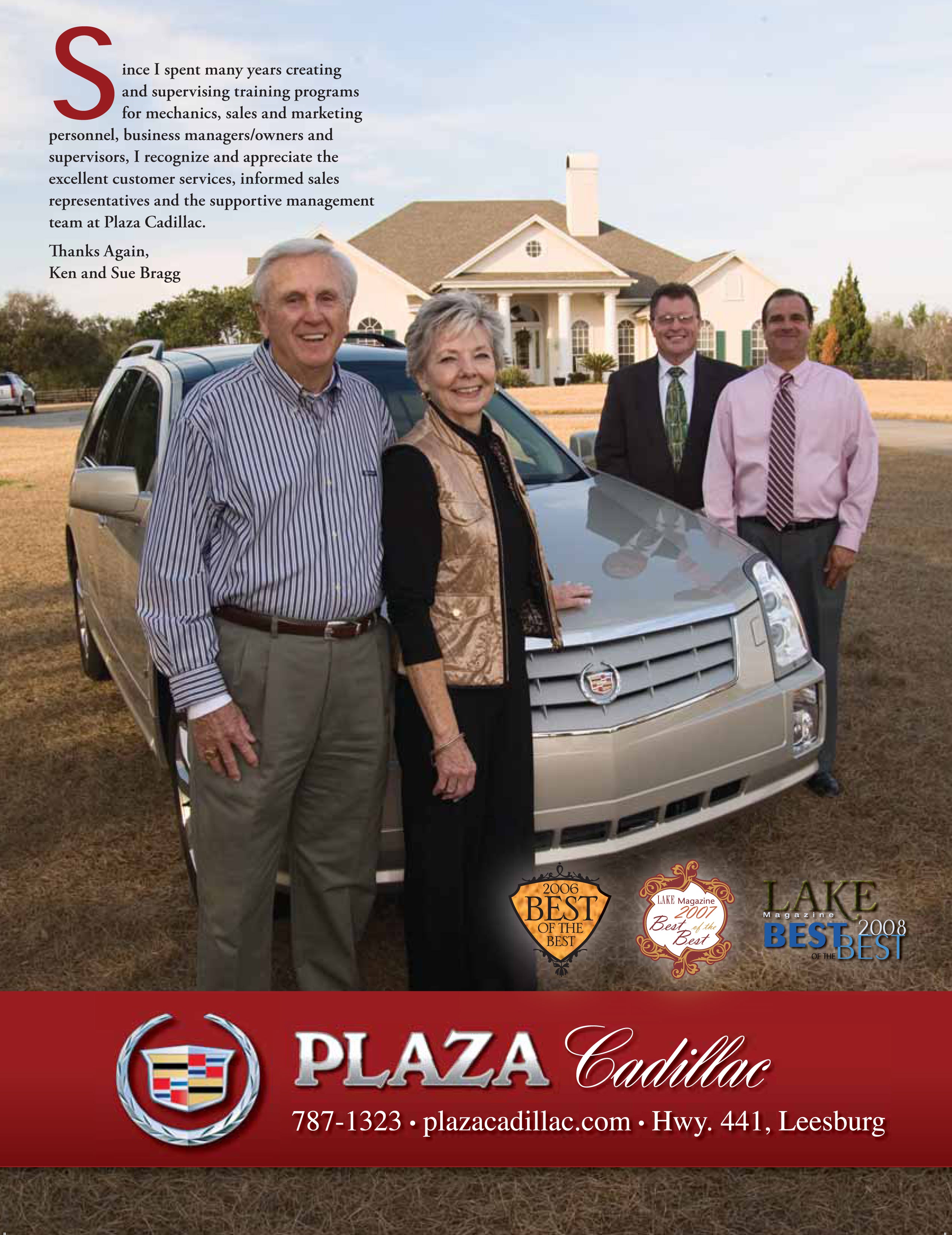 4 adults next to a silver Cadillac