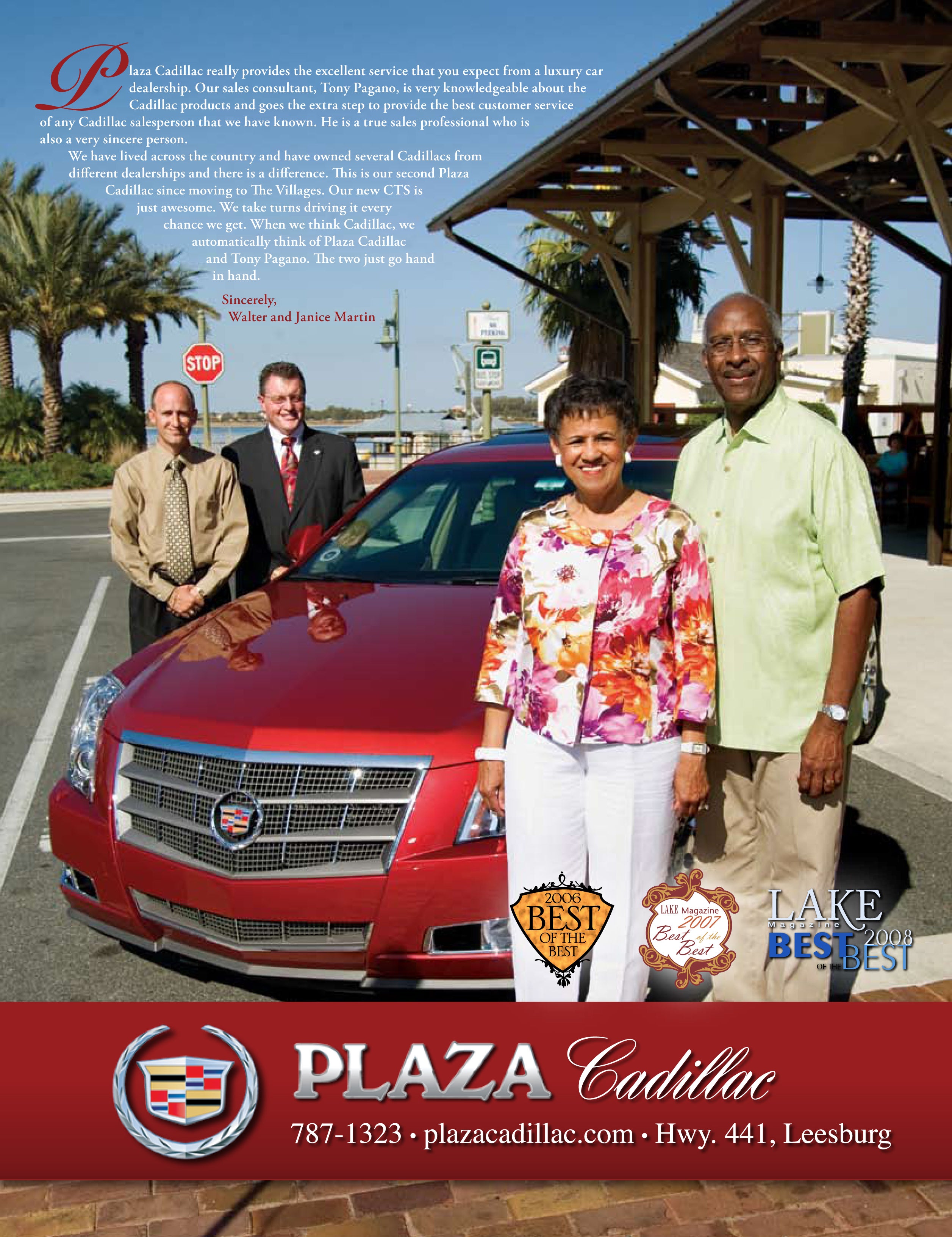 4 adults next to a red Cadillac
